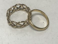 An 18ct gold band ring and a 9ct gold Celtic knot ring CONDITION REPORT: 18ct - 1.8g.