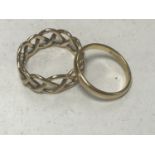 An 18ct gold band ring and a 9ct gold Celtic knot ring CONDITION REPORT: 18ct - 1.8g.