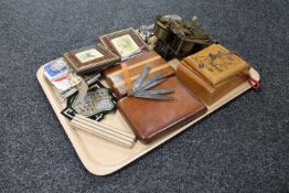 A tray containing miscellany including clock movement, a vintage ball game, leather cigar case,