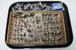 A tray of 20th century miniature lead figures - cavalry, painted and unpainted.