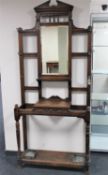 An Edwardian oak mirrored hall stand