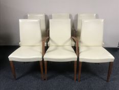 A set of six contemporary cream leather upholstered dining chairs