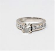 A fine 18ct white gold solitaire diamond ring by Heurgon, Paris,