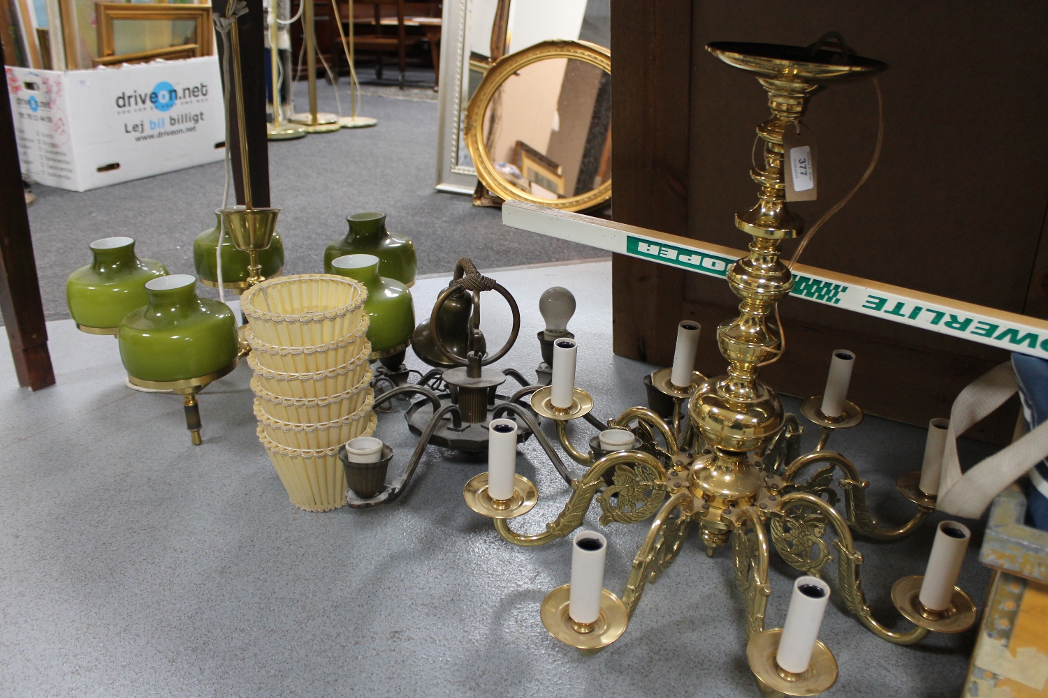 An eight way continental brass light fitting together with a six way light fitting