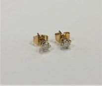 A pair of diamond stud earrings mounted in yellow 9ct gold, approximately 0.2ct.