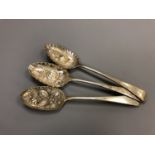 Three Georgian silver repousse spoons