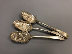 Three Georgian silver repousse spoons