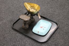 A set of cast iron scales with brass graduated weights together with a Wade Johnnie Walker ashtray