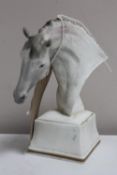 A Royal Worcester horses head on plinth