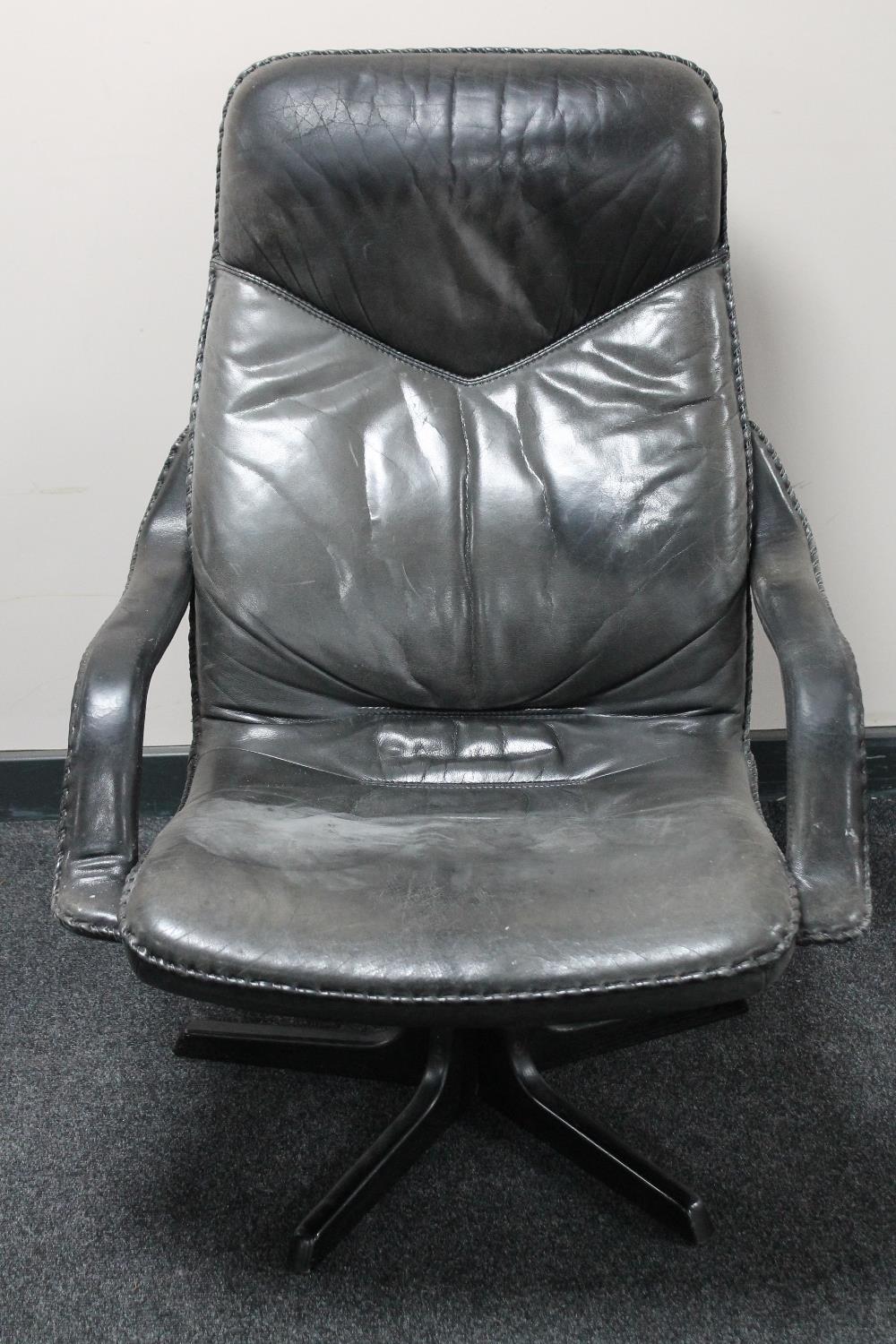 A late 20th century Danish leather upholstered adjustable armchair