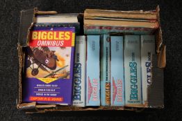 A box containing Biggles Omnibus and Big Story book collections together with two mid 20th century