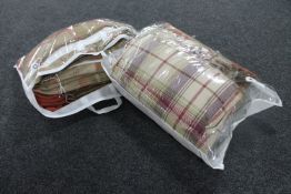 Two bags containing two pairs of tartan curtains, 90",