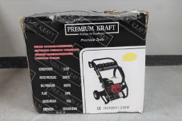 A boxed Premium Craft 2500psi pressure washer