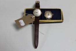 A boxed gent's 9ct gold Accurist wristwatch on brown leather strap and a Navda watch face