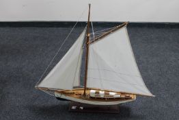 A wooden model of a yacht