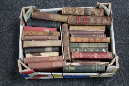 A box containing antiquarian volumes including poetry and novels