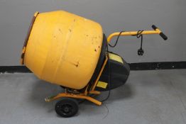 A Master Mix electric cement mixer