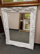 A Victorian style white painted mirror 102 cm x 131 cm