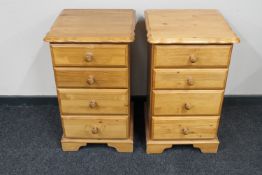 A pair of Aylesbury Pine four drawer bedside chests