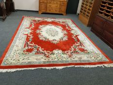 A Chinese carpet on red ground,