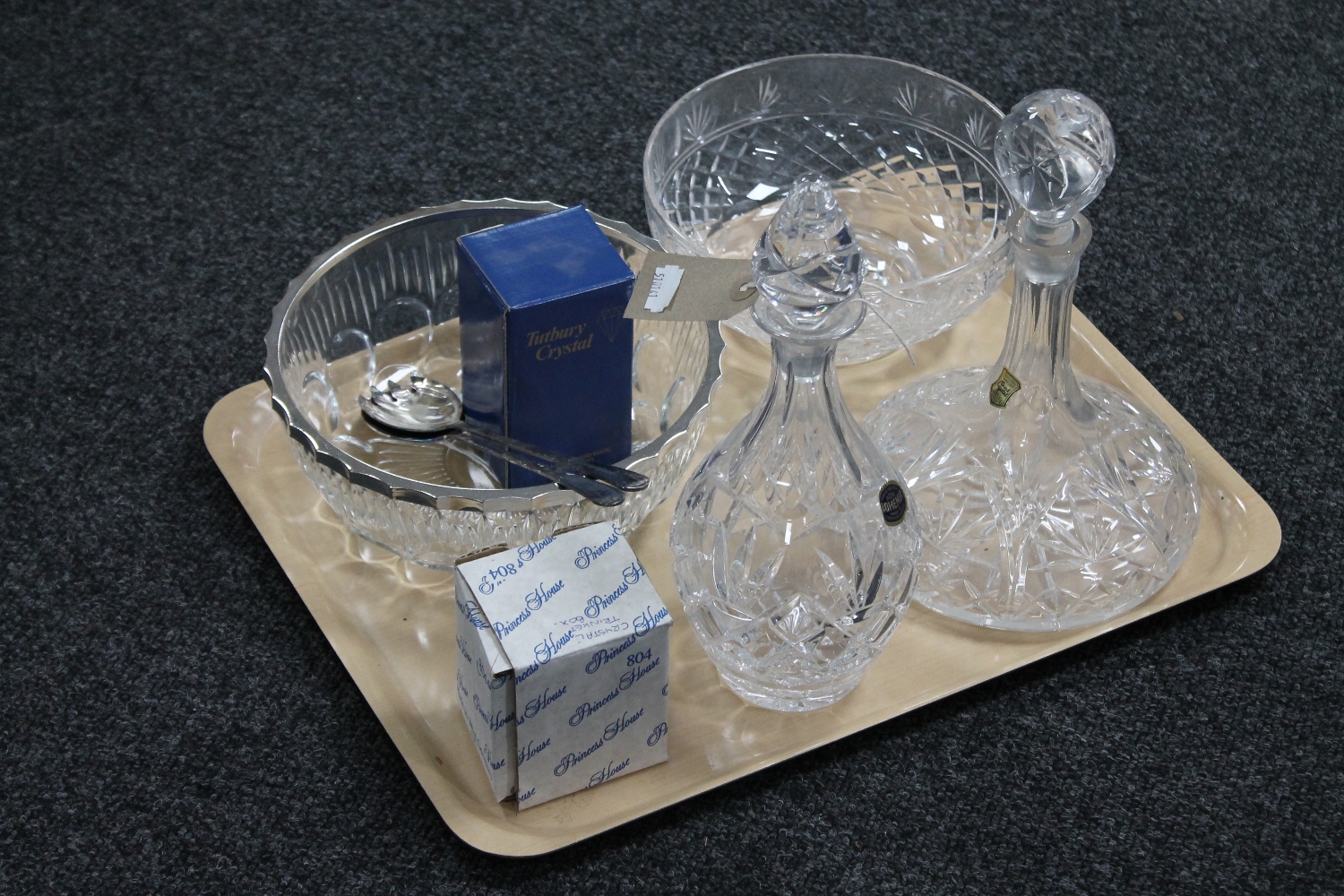 A tray of two lead crystal decanters, bowl,