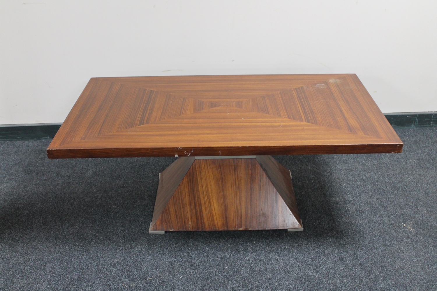 An Art Deco rosewood effect coffee table