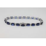 A 14ct white gold sapphire and diamond tennis bracelet, featuring 20 sapphires 12.