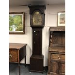 An oak eight day longcased clock with brass dial, height 220 cm.