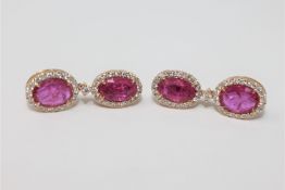 A pair of 14ct yellow gold ruby and diamond drop earrings featuring 4 rubies 4.