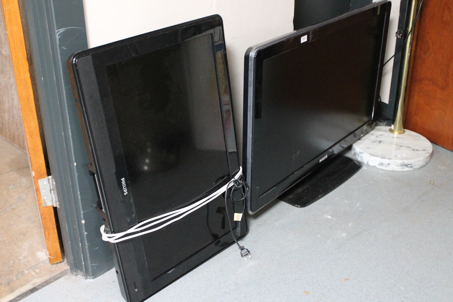 A Philips 42 inch LCD TV with 32 inch LCD TV (continental wiring and untested)