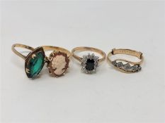 A 9ct gold synthetic emerald ring, a 9ct gold cluster ring,