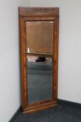 An antique continental mahogany hall mirror
