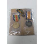 Two WWI medals on ribbons with accompanying miniature medals on ribbons : F. Newby, A.B.