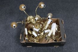 A box of two continental brass light fittings together with a set of four two-way wall lights and a