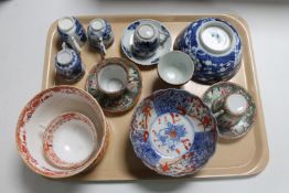 A tray of seventeen pieces of antique and later Chinese porcelain : Imari bowl, tea cups,
