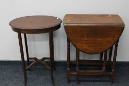 An early 20th century oak gateleg table together with an oval Victorian mahogany occasional table