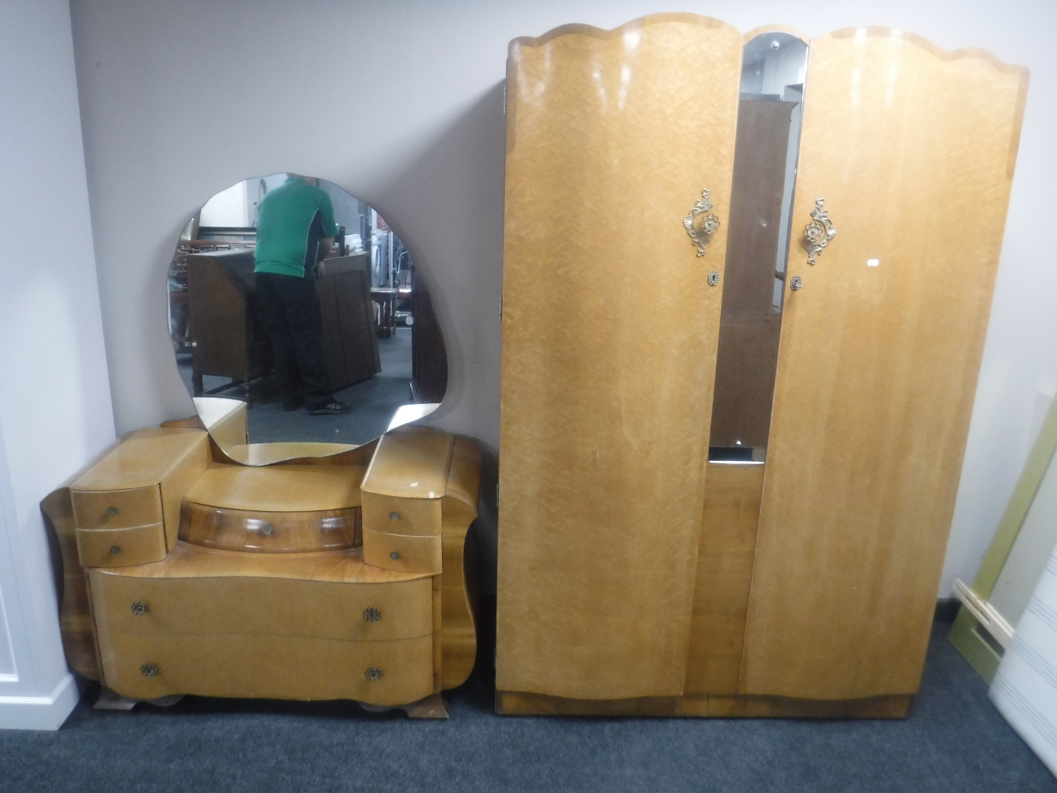 A 1930's bird's eye maple double door wardrobe with dressing table