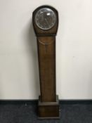An oak granddaughter clock