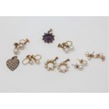 Five pairs of gold mounted pearl earrings,