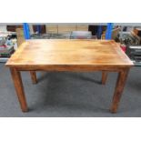 Three sheesham wood dining tables,