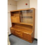 A twentieth century teak sideboard