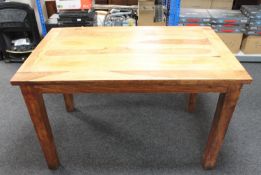 Four sheesham wood dining tables,