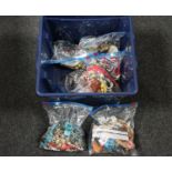 A box containing seven bags of assorted costume jewellery