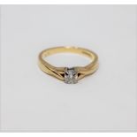 An 18ct gold diamond solitaire ring, approximately 0.2ct, size N 1/2.