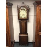 A 19th century oak longcase clock, with painted dial, signed E Dixon of Hexham,