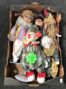 A box of five porcelain headed clown dolls