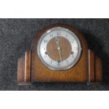 A 1930's oak Smiths Enfield mantel clock with pendulum CONDITION REPORT: There is