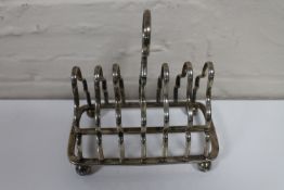 A silver toast rack,