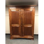 A good quality mahogany double door wardrobe,