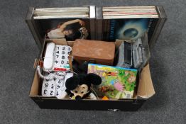 A box containing cine camera, car radio, big button telephones,